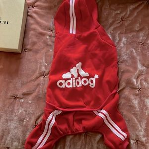 Adidog track suit.